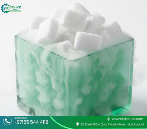 Dry ice cubes in green container with cooling fog – Dry Ice UAE supplier Dubai